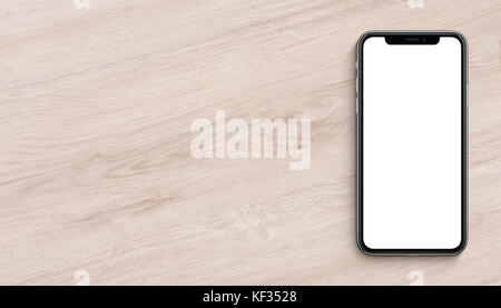 Smartphones wie iPhone X mockup flach Draufsicht liegen auf Holz- büro Schreibtisch. Banner mit kopieren. Stockfoto