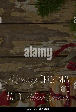 Digital composite Der frohe Weihnachten und ein glückliches neues Jahr text auf Weihnachten Hintergrund Stockfoto