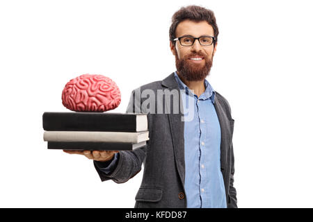 Professor mit einem Stapel Bücher und ein Gehirn, das Modell auf weißem Hintergrund Stockfoto