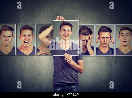 Maskierte junge Mann verschiedene Emotionen ausdrücken Stockfoto