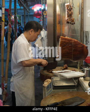 Markt Verkäufer auf Yau Markt Tei indoor Food Market, Hongkong, China, Asien. Stockfoto