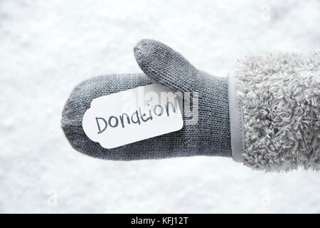 Wolle Handschuh, Label, Schnee, englische Text Volunteer Stockfotografie -  Alamy
