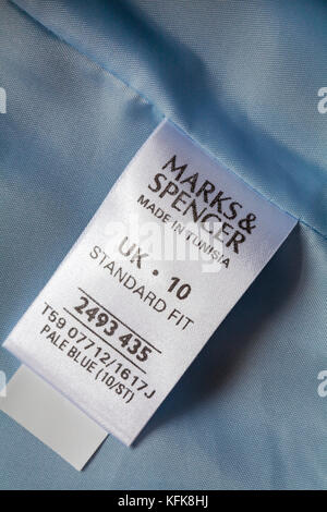 In Tunesien label in Marks & Spencer's Pale Blue Woman jacke Standard Fit - im UK Vereinigtes Königreich, Großbritannien verkauft, Stockfoto