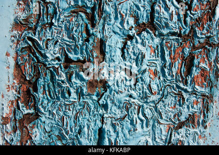 Blue Rusty Hintergrund, rau, Textur in die Risse. Korrosion von Metall Eisen. Stockfoto