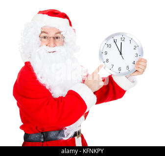 Santa auf die Uhr zeigt die Zeit auf weißen Hintergrund zeigen Stockfoto