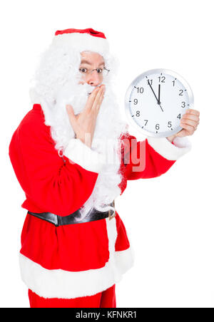 Santa auf die Uhr zeigt die Zeit auf weißen Hintergrund zeigen Stockfoto