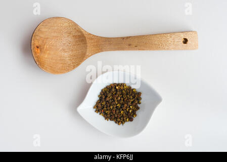 Sichuan Piroggen mit Holz Löffel Stockfoto