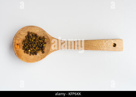 Sichuan Piroggen in einem hölzernen Löffel Stockfoto