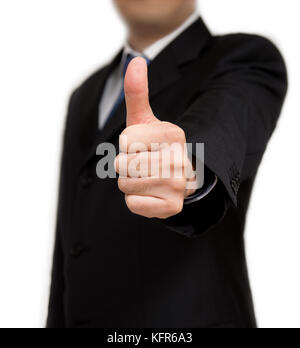 Unternehmer im schwarzen Anzug Daumen hoch, die isoliert auf weißem Hintergrund. Stockfoto