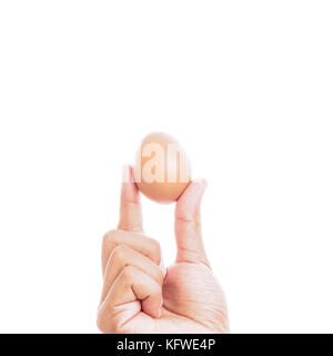 Mann hand Ei auf weißem Hintergrund Stockfoto