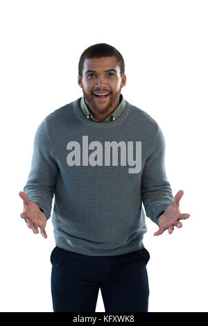 Portrait von überrascht Mann vor weißem Hintergrund Stockfoto