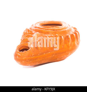 Eine Makroaufnahme einer Replik terrakotta Olivenöl Lampe aus biblischen Zeiten. Stockfoto