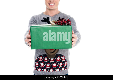 Mann mit Weihnachtsgeschenk Stockfoto