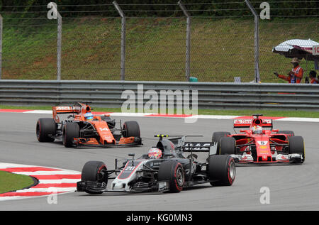 Formel 1 Grand Prix von Malaysia – Renntag mit: Kevin MAGNUSSEN, Sebastian VETTEL, Fernando ALONSO Wo: Sepang, Selangor, Malaysia Wann: 11. November 2011 Credit: ATP/Thinakaran Shanmugam/WENN.com Stockfoto