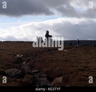 Sitzende Figur von Sean Henry vom 25. Oktober 2017 Stockfoto