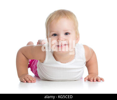 Süße kleine Mädchen liegen auf dem Boden. studio Shot Stockfoto