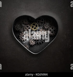 Metal Heart mit Getrieben und Zahnrädern 3D-Darstellung Stockfoto