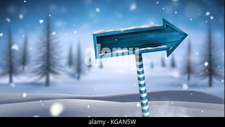 Digital composite der hölzernen Wegweiser in Weihnachten Winter Landschaft Stockfoto