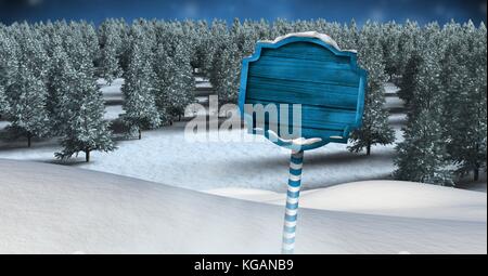 Digital composite der hölzernen Wegweiser in Weihnachten Winter Landschaft Stockfoto