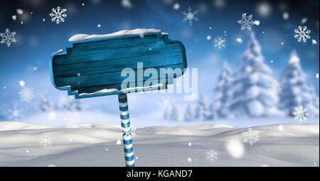 Digital composite der hölzernen Wegweiser in Weihnachten Winter Landschaft Stockfoto