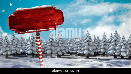 Digital composite der hölzernen Wegweiser in Weihnachten Winter Landschaft Stockfoto