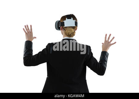 Ansicht der Rückseite des Geschäftsfrau mit Virtual reality Headset Stockfoto