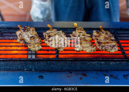 Street Food - gegrilltes Schweinefleisch Stockfoto