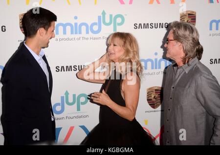 Novak Djokovic, Goldie Hawn, Kurt Russell  bei Ankunft für Goldie's Love in for Kids, Ron Burkle's Green Acres Estate, Beverly Hills, CA 3. November 2017. Foto: Priscilla Grant/Everett Collection Stockfoto