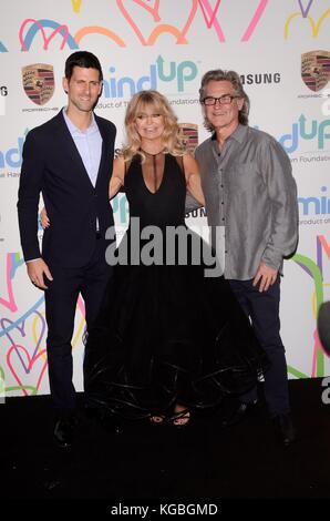 Novak Djokovic, Goldie Hawn, Kurt Russell  bei Ankunft für Goldie's Love in for Kids, Ron Burkle's Green Acres Estate, Beverly Hills, CA 3. November 2017. Foto: Priscilla Grant/Everett Collection Stockfoto