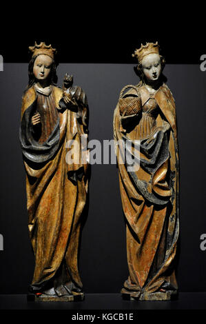 Saint Margaret und Saint doroty, Ca. 1500. aus mehrfarbigem Holz geschnitzt. belk, Polen, Schlesisches Museum. Katowice Polen. Stockfoto