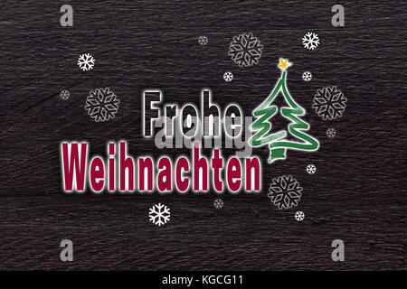 Frohe Weihnachten Frohe Weihnachten (in deutscher Sprache) mit Schneeflocken auf braunem Holz Weihnachtskarte. Stockfoto