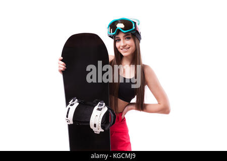 Hübsche junge brünette Frau in Schwarz kurze Tank Top halten snowboa Stockfoto