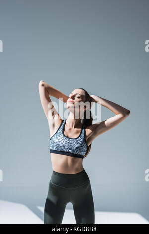 Entspannt Frau in Sportswear Stockfoto