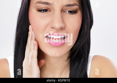 Junge Frau in Zahn Schmerzen Stockfoto