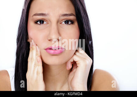Schöne junge Frau in Zahn Schmerzen Stockfoto