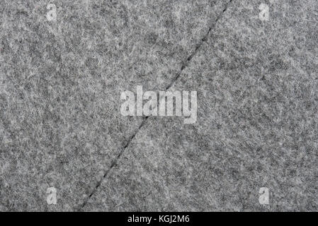Grau Baumwolle mit Stichen. Textur von grauer Stoff Material Stockfoto