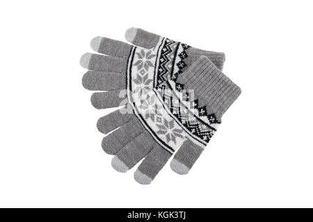 Gestrickte Handschuhe aus Wolle grau auf weißem Hintergrund. Stockfoto