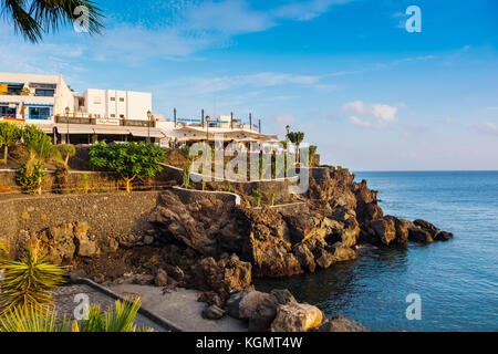 Restaurant bei Sonnenuntergang, Fischerhafen, Puerto del Carmen. Lanzarote Island. Kanarische Inseln Spanien. Europa Stockfoto