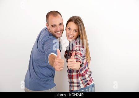 Freundliche Paar zeigen Daumen hoch Stockfoto