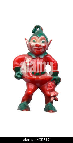 Antique vintage Weihnachten Elf tree ornament. elf Holding Puppe und Welpen. isoliert. Stockfoto