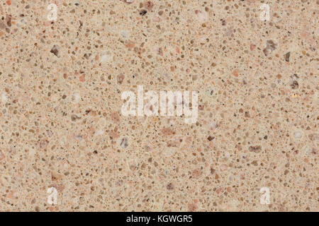 Beige künstlicher Stein -Textur. Stockfoto
