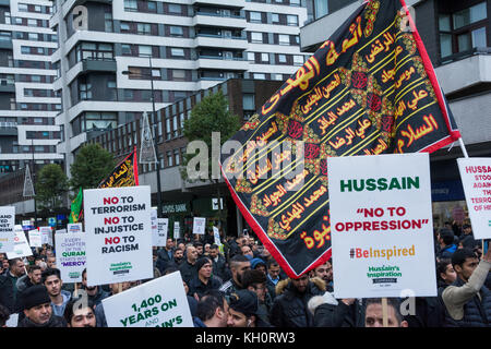 London, Großbritannien, 11th. November 2017. Tausende von Muslimen marschierten von Marble Arch nach Paddington Green über die Edgware Road mit Transparenten und Plakaten.die Plakate waren Parolen wie Männer und Frauen, die im islam gleich sind, Hussain die ewige Inspiration, vereint gegen Terrorismus, Nein zur Unterdrückung, Muslime vereint gegen Terrorismus, Hussain stand gegen den Terrorismus seiner Zeit. Hussain Ibn Ali war der Enkel des Propheten Muhammad. Kredit: Steve Bell/Alamy Live Nachrichten Stockfoto