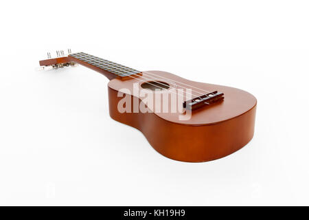 Ein natürliches Holz ukulele auf weißem Hintergrund Stockfoto