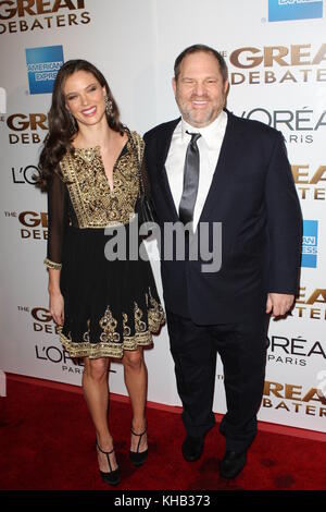 NEW YORK - 19. DEZEMBER 2007: Produzentin Harvey Weinstein und Frau Designerin Georgina Chapman nehmen an der New Yorker Premiere von 'The Great Debaters' im Ziegfeld Theater am 19. Dezember 2007 in New York City Teil.Personen: Harvey Weinstein: Georgina Chapman Stockfoto
