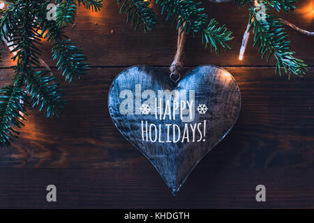 Happy holidays Grußkarte, dunklen Hintergrund mit Herz und Liebe Stockfoto