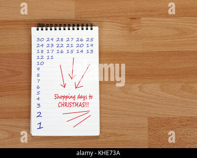 Countdown. Shopping Tage bis Weihnachten. notepad auf dem Schreibtisch. Stockfoto