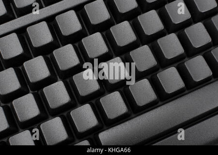 Schwarze Tastatur mit Blindfarbe QWERTY. Für Dateneingabe, E-Mail und Datenschutz, Darkweb, Daten-Cyberangriff, Technologiediebstahl in China, Cyber-Bedrohung, Hacktivismus Stockfoto