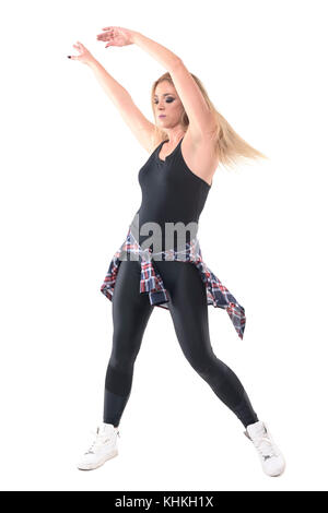 Bewegung der jungen weiblichen Jazz dancer Arme schwingen in der Luft gestoppt. voller Körper Länge Porträt über weiße studio Hintergrund isoliert. Stockfoto