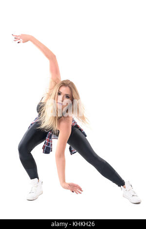 Blond verbogen weiblichen Jazz dancer Leistung mit den Armen schwingen in s gebogene Position. volle Gehäuselänge Portrait auf weiße studio Hintergrund isoliert. Stockfoto