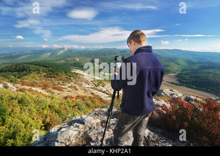 Fotografen arbeiten in Berg. job Szene. Stockfoto